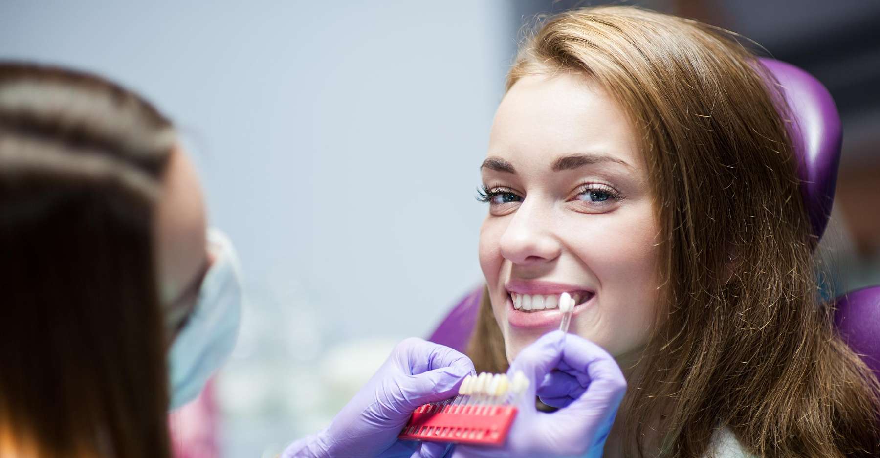 woman getting porcelain veneers in urbandale